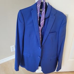 Royal blue suit with purple tie